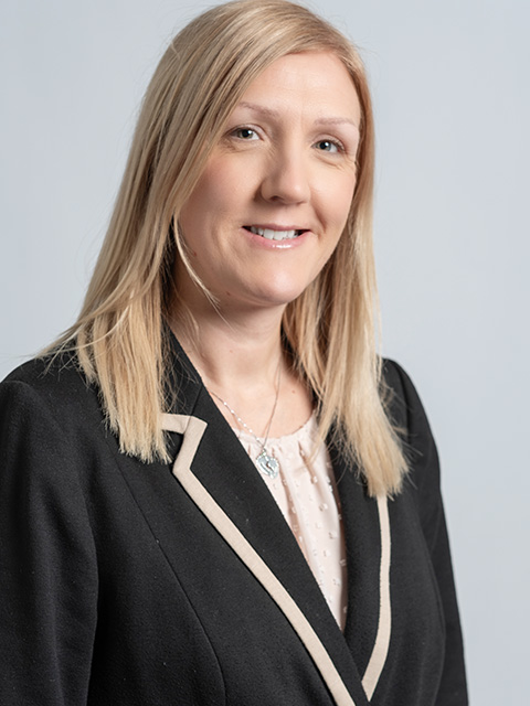 Portrait photograph of ABCE staff member, Carolyn Kavanagh